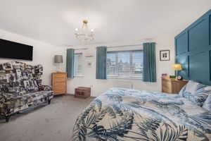 Bedroom One- click for photo gallery